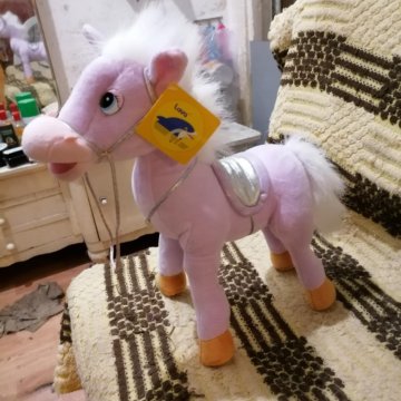 Музыкальная игрушка ( Лошадь )