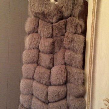 Жилетка меховая новая