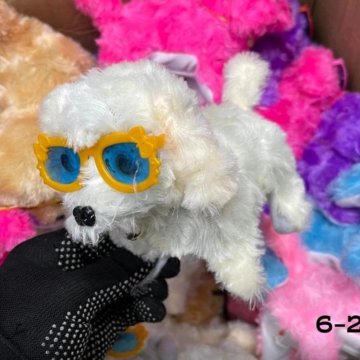 Удивительная игрушка собачка