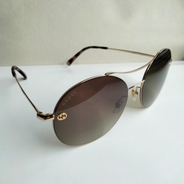 Солнцезащитнын очки Gucci круглой формы в титаново