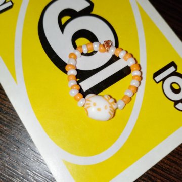 Колечко с Hello Kitty оранжевое.