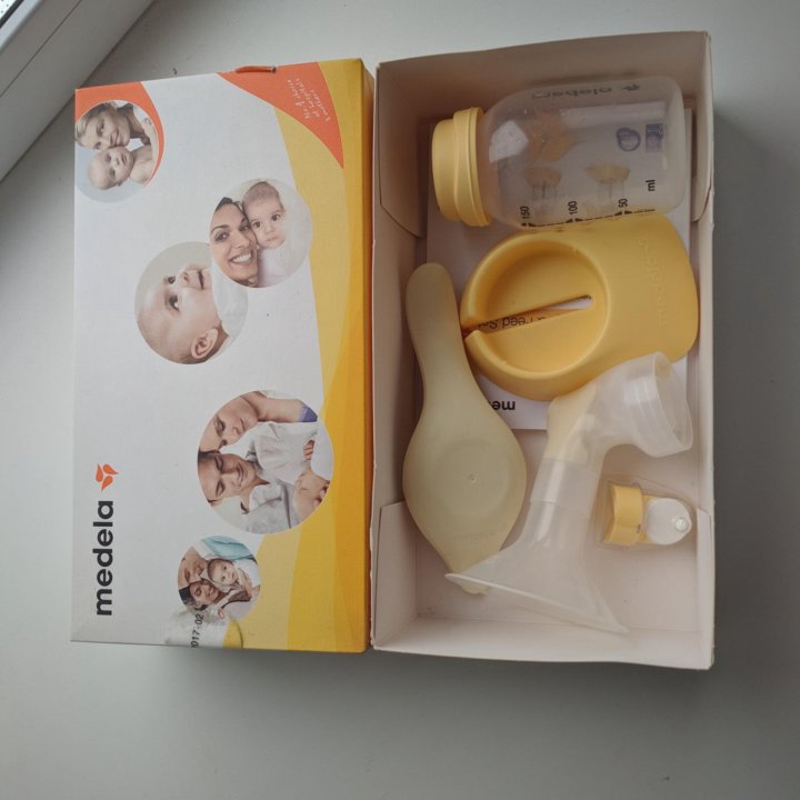 Молокоотсос medela