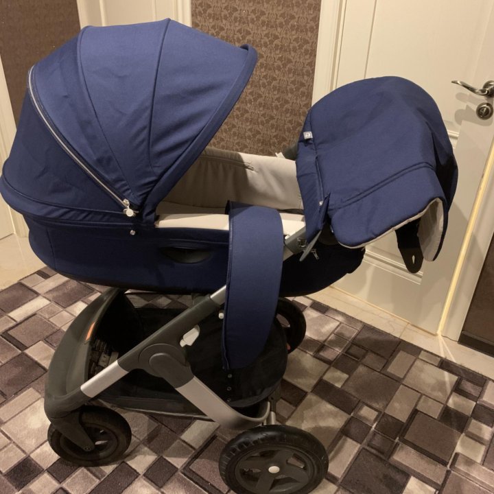 Коляска стоке stokke