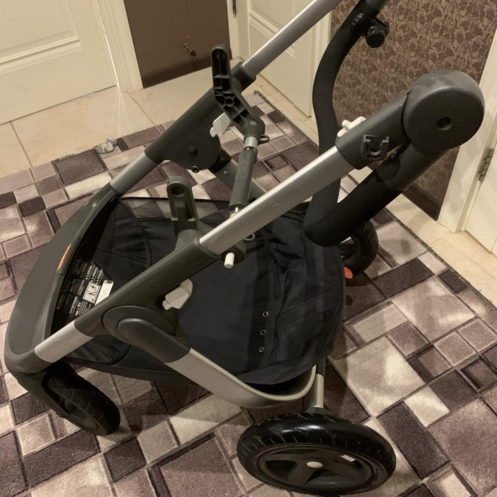 Коляска стоке stokke