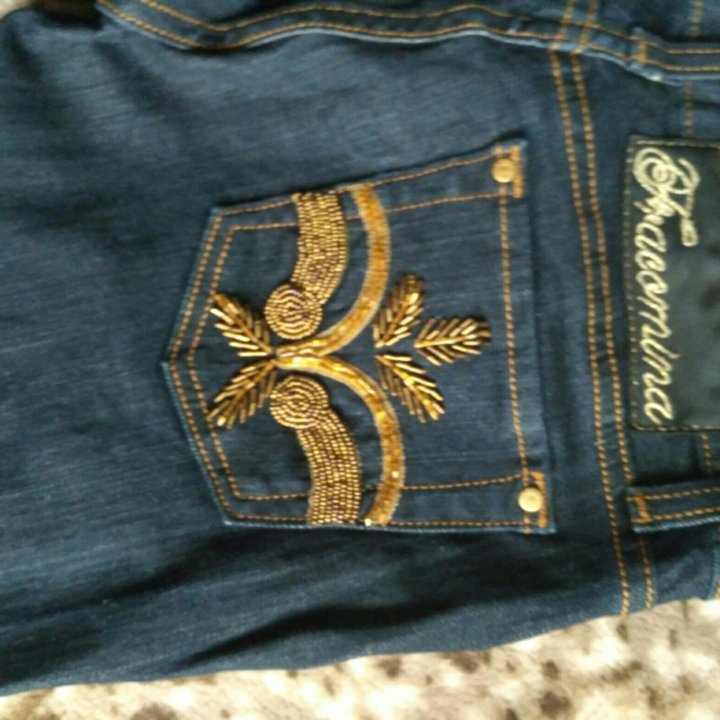 Джинсы новые