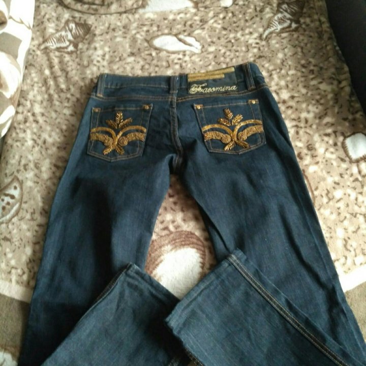 Джинсы новые