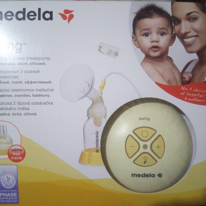 Молокоотсос Medela, электронный.