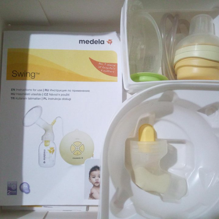 Молокоотсос Medela, электронный.