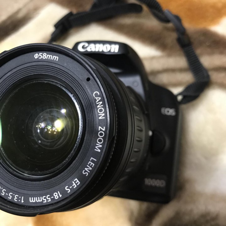 Зеркальный фотоаппарат canon d1000