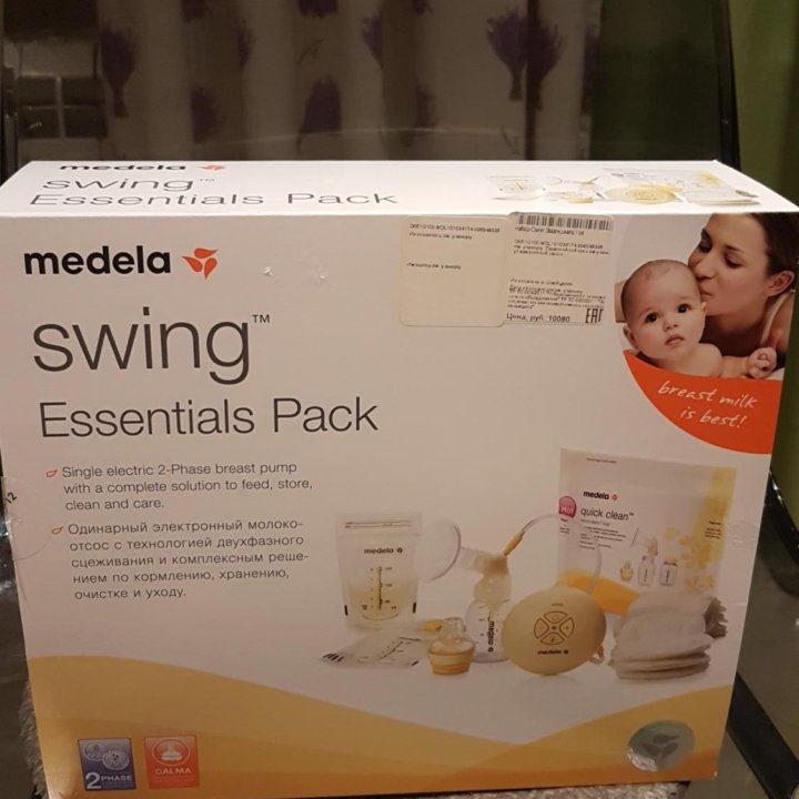 Молокоотсос Medela Swing Essentials pack