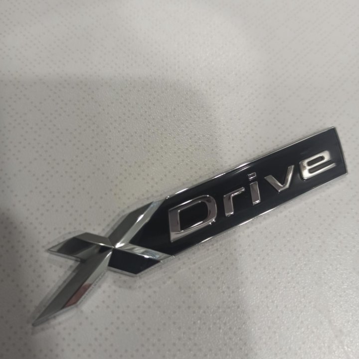 Шильдик BMW X-Drive