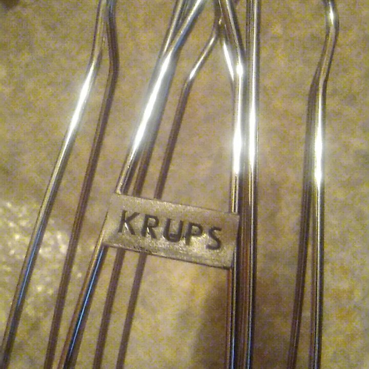 Вращающийся держатель для капсул Krups