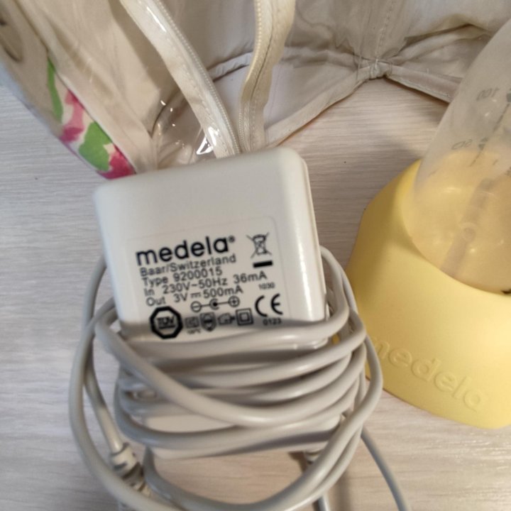 Молокоотсос medela электрический