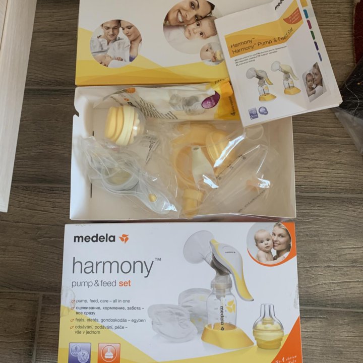 Молокоотсос medela harmony новый