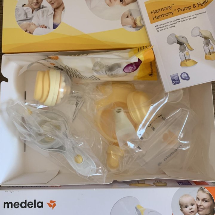 Молокоотсос medela harmony новый