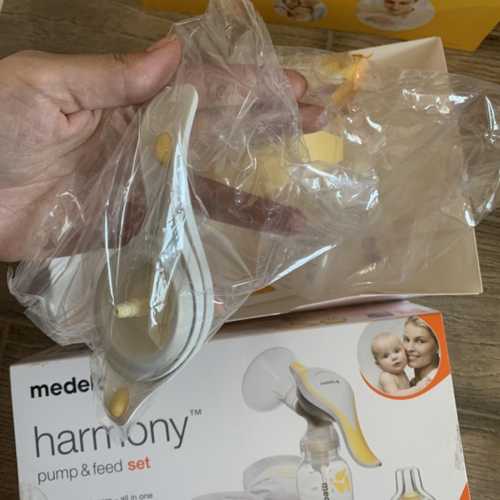 Молокоотсос medela harmony новый