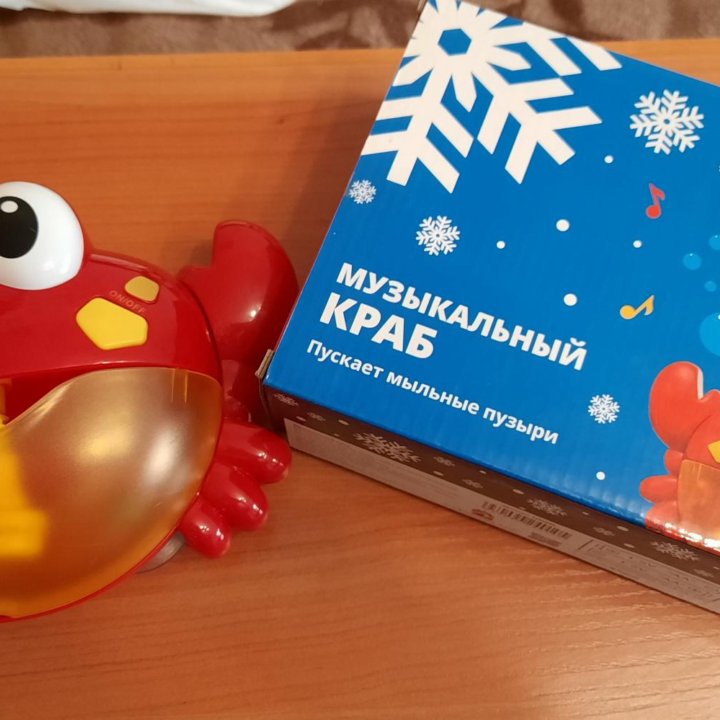 Игрушка. Краб музыкальный.