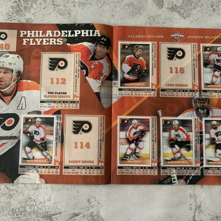 Частично заполненный альбом Panini NHL 2012-2013