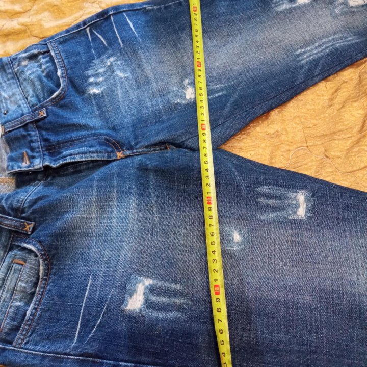 Джинсы капри