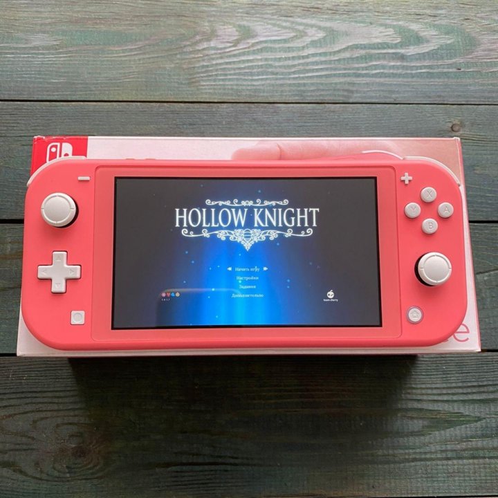 Nintendo Switch Lite + игры