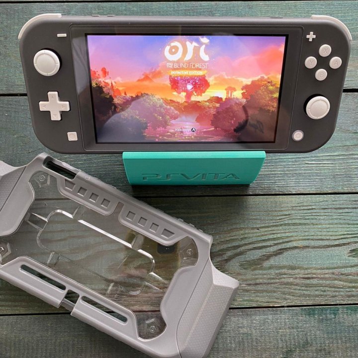 Nintendo Switch Lite + много игр