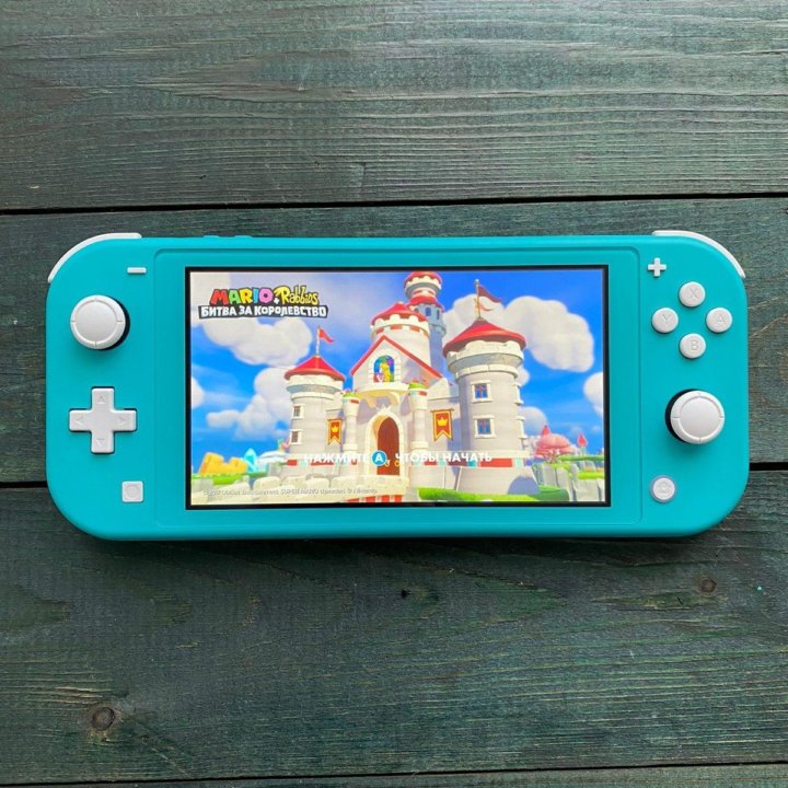 Nintendo Switch Lite + много игр
