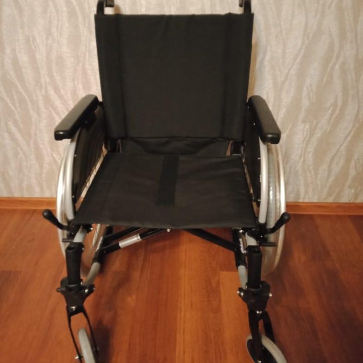 Инвалидная коляска