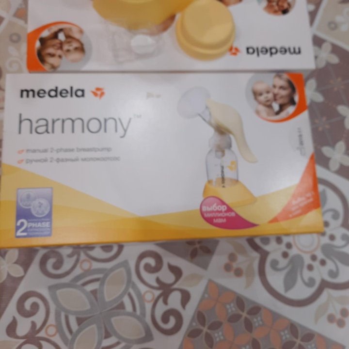 Молокоотсос Medela ручной