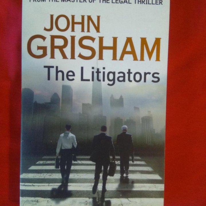 книга John Grisham: The Litigators