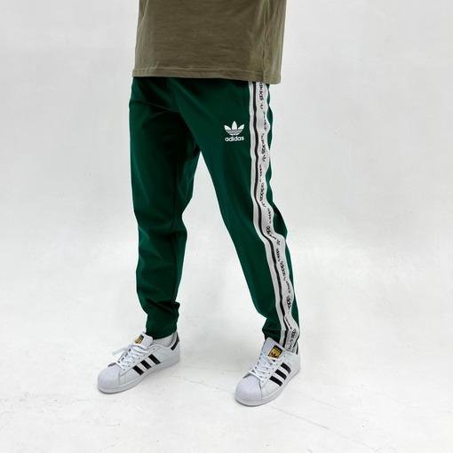 Спортивные штаны лампасы зеленые adidas