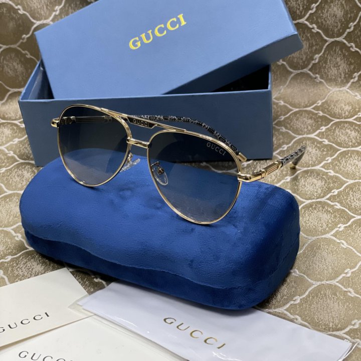 Солнцезащитные очки Gucci