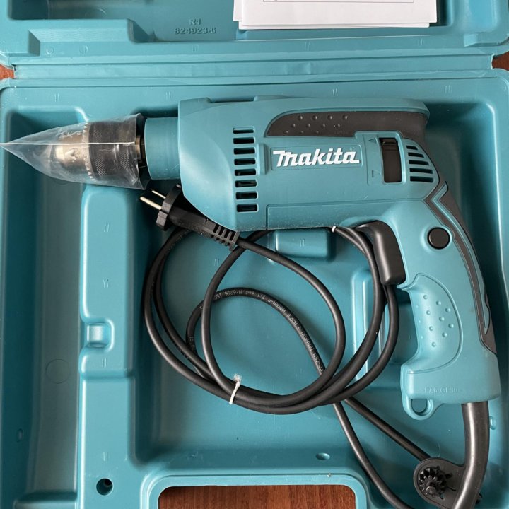 Ударная дрель Makita HP1640K