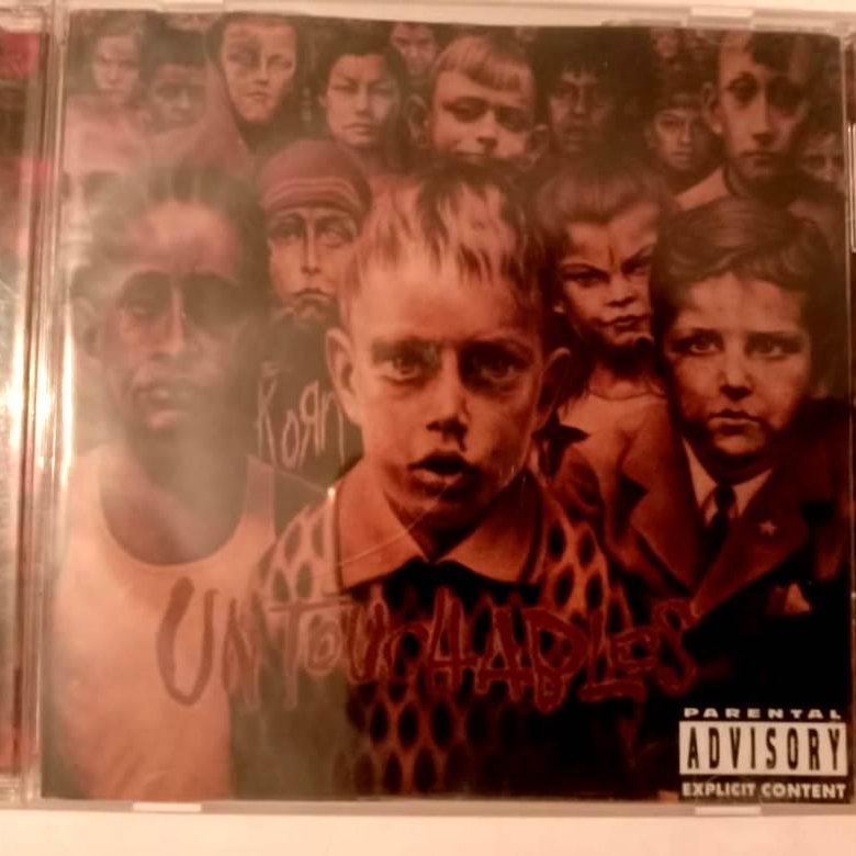 Korn untouchables. Korn альбом untouchable. korn untouchables 2002. группа неприкасаемые альбомы.