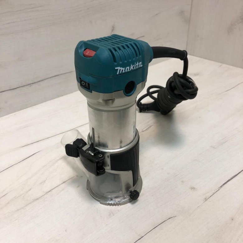 Деревообрабатывающий электрический триммер фрезерование. Фрезер макита rt0700cx2. Фрезер makita rt 0700 с. Фрезер кромочный rt0700c. Makita 0700c.
