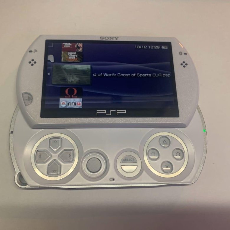 Псп го и псп. Псп оранжевая. Psp go игры. Псп слайдер. Psp go игры.