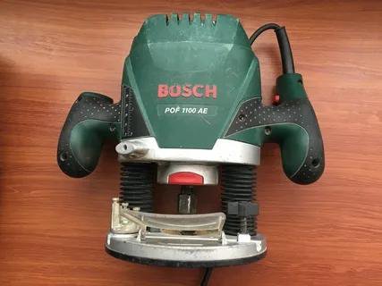 Фрезер bosch. Bosch 1100 фрезер. Фрезер POF 1100. Bosch POF 1100 AE Bosch POF 1100 AE. Подошва для фрезера Bosch POF 1100.